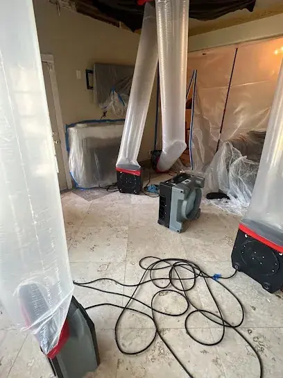 Restoration crew working in a Mahwah, NJ home after water damage